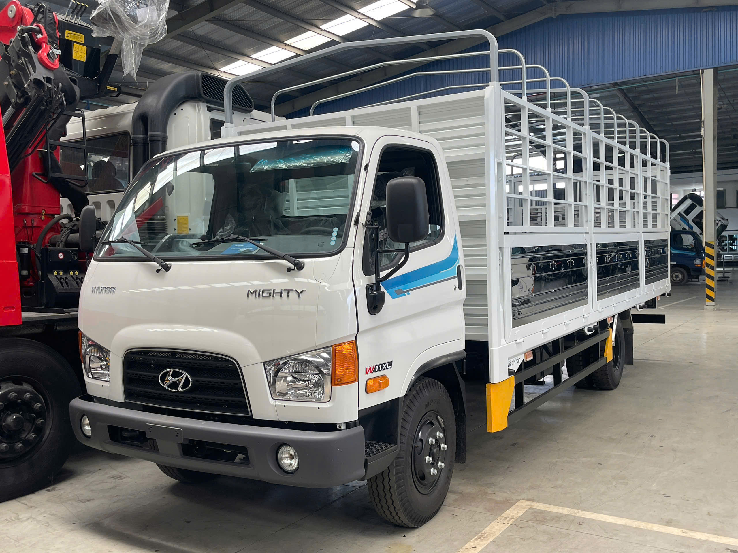  MIGHTY W11XL E5 TẢI 7 TẤN THÙNG 6.4 MÉT